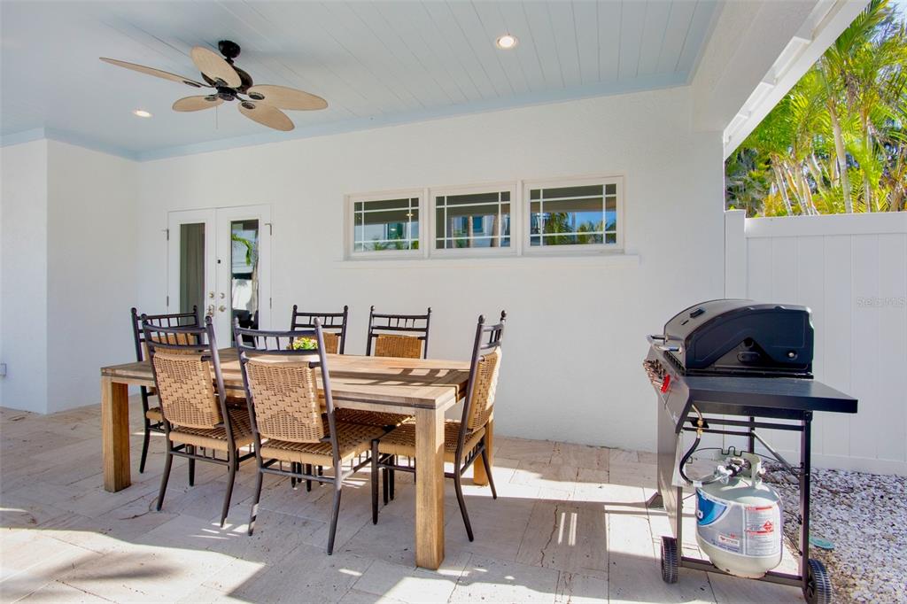 709 Fern Street Anna Maria, FL 34216 - Photo 9 of 35 a view of a dining room with furniture