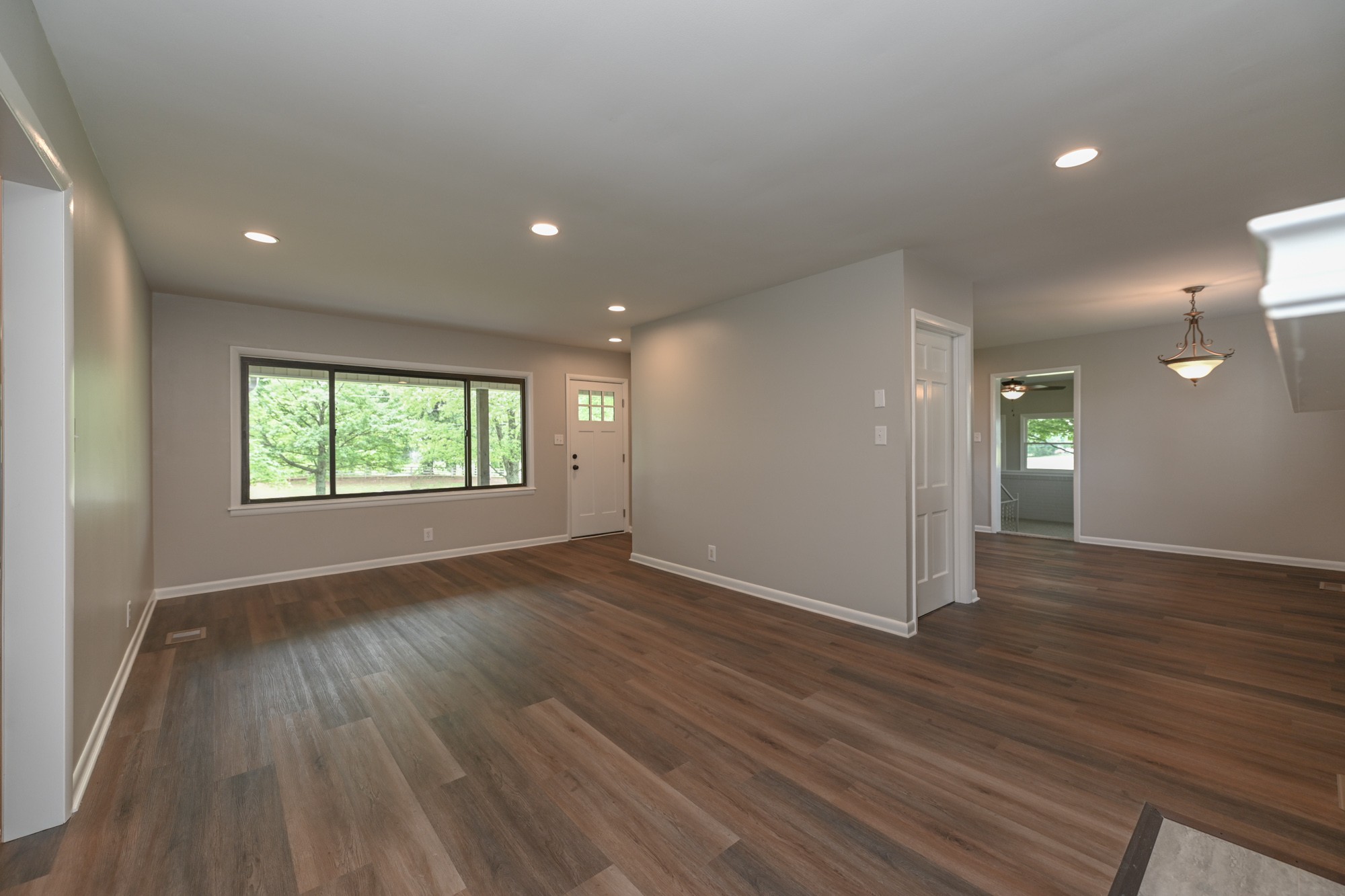 4334 Mt Zion Road Springfield, TN 37172 - Photo 11 of 52 an empty room with wooden floor and windows