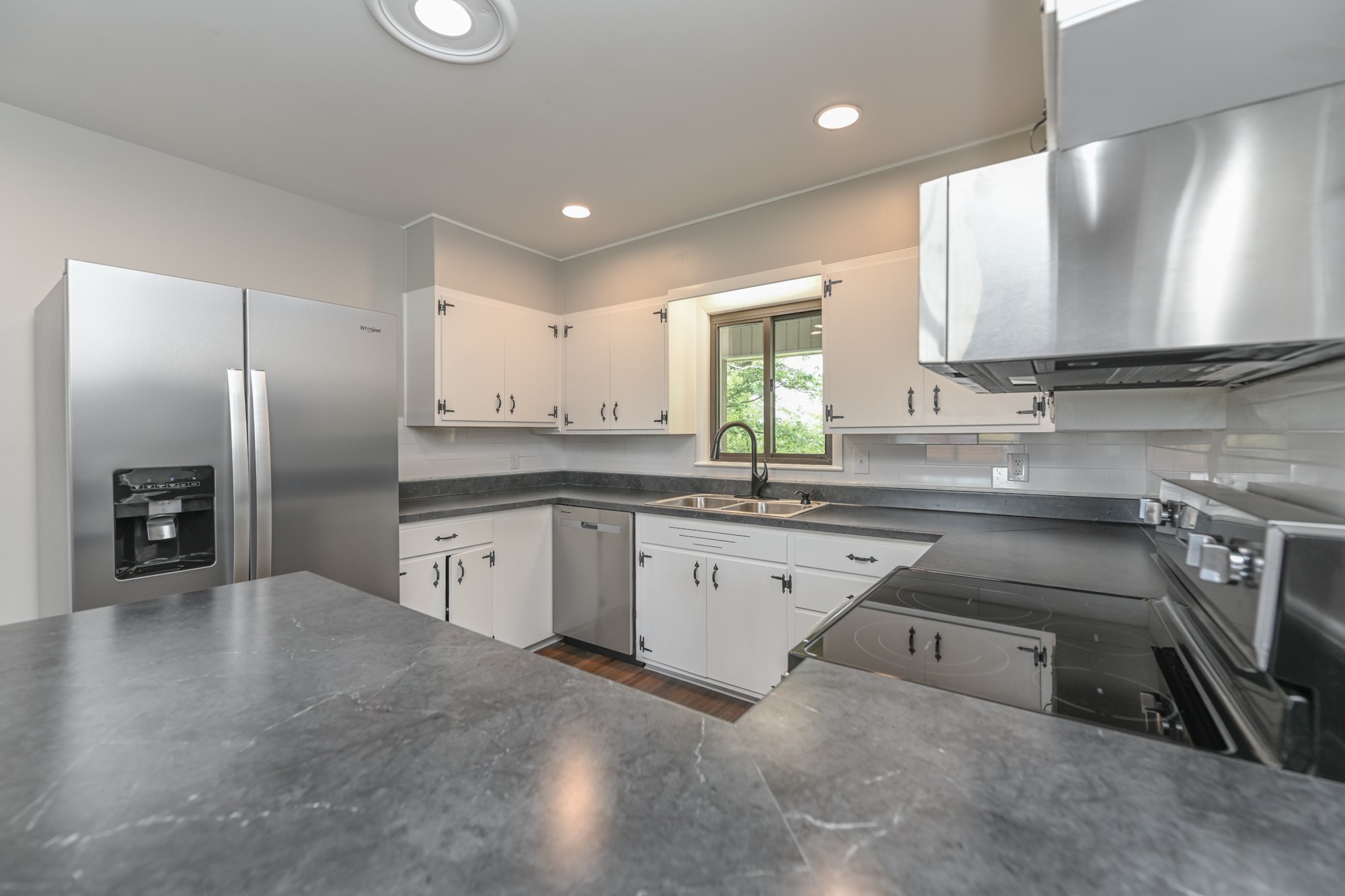 4334 Mt Zion Road Springfield, TN 37172 - Photo 15 of 52 a kitchen with a sink stove and refrigerator