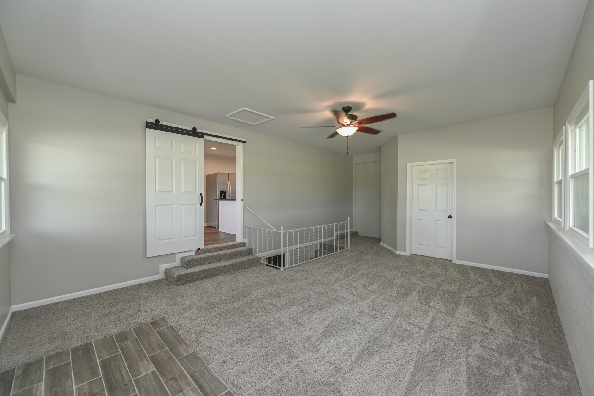 4334 Mt Zion Road Springfield, TN 37172 - Photo 21 of 52 an empty room with windows and ceiling fan