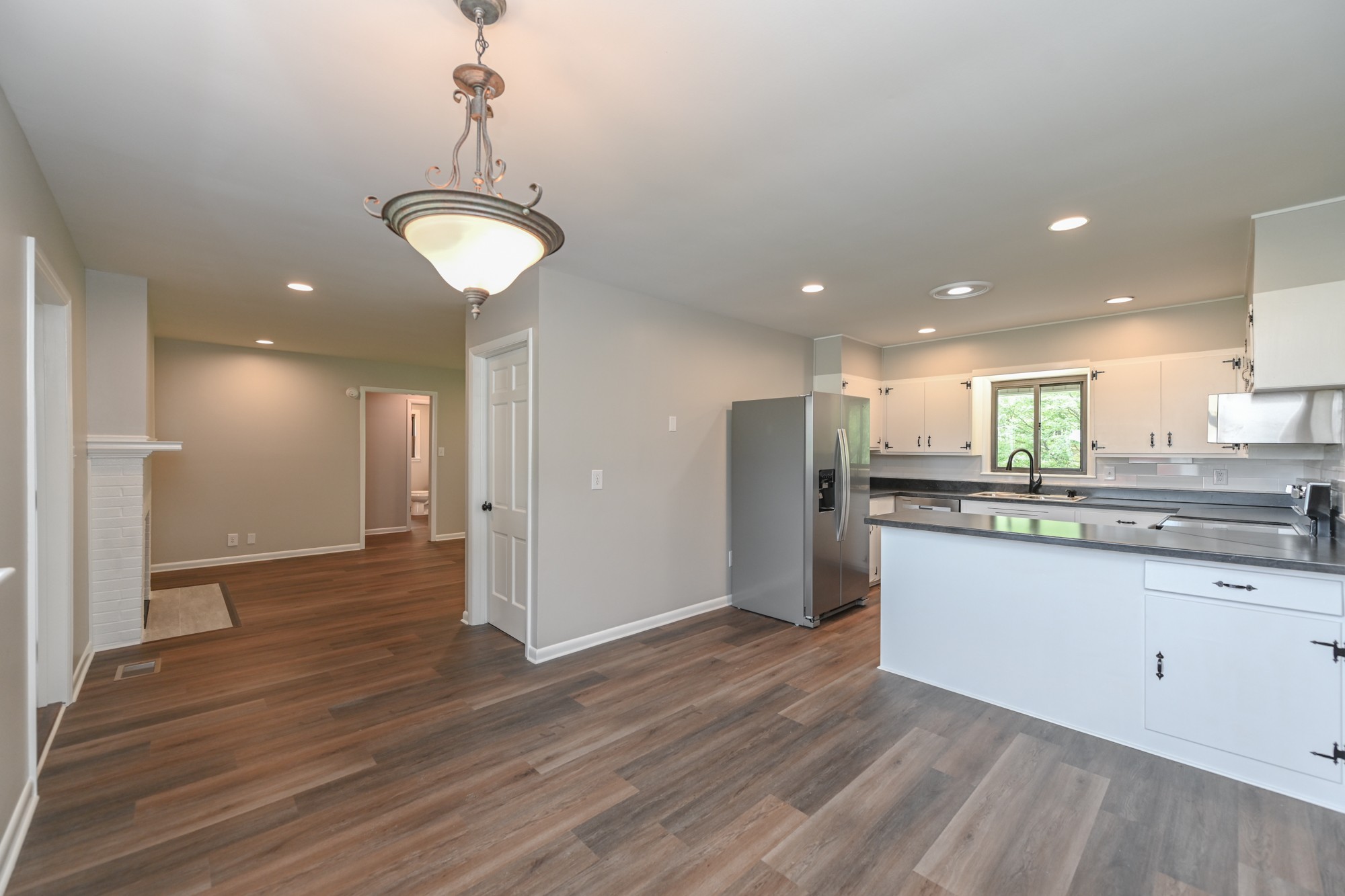 4334 Mt Zion Road Springfield, TN 37172 - Photo 24 of 52 a view of a kitchen center island wooden floor and appliances
