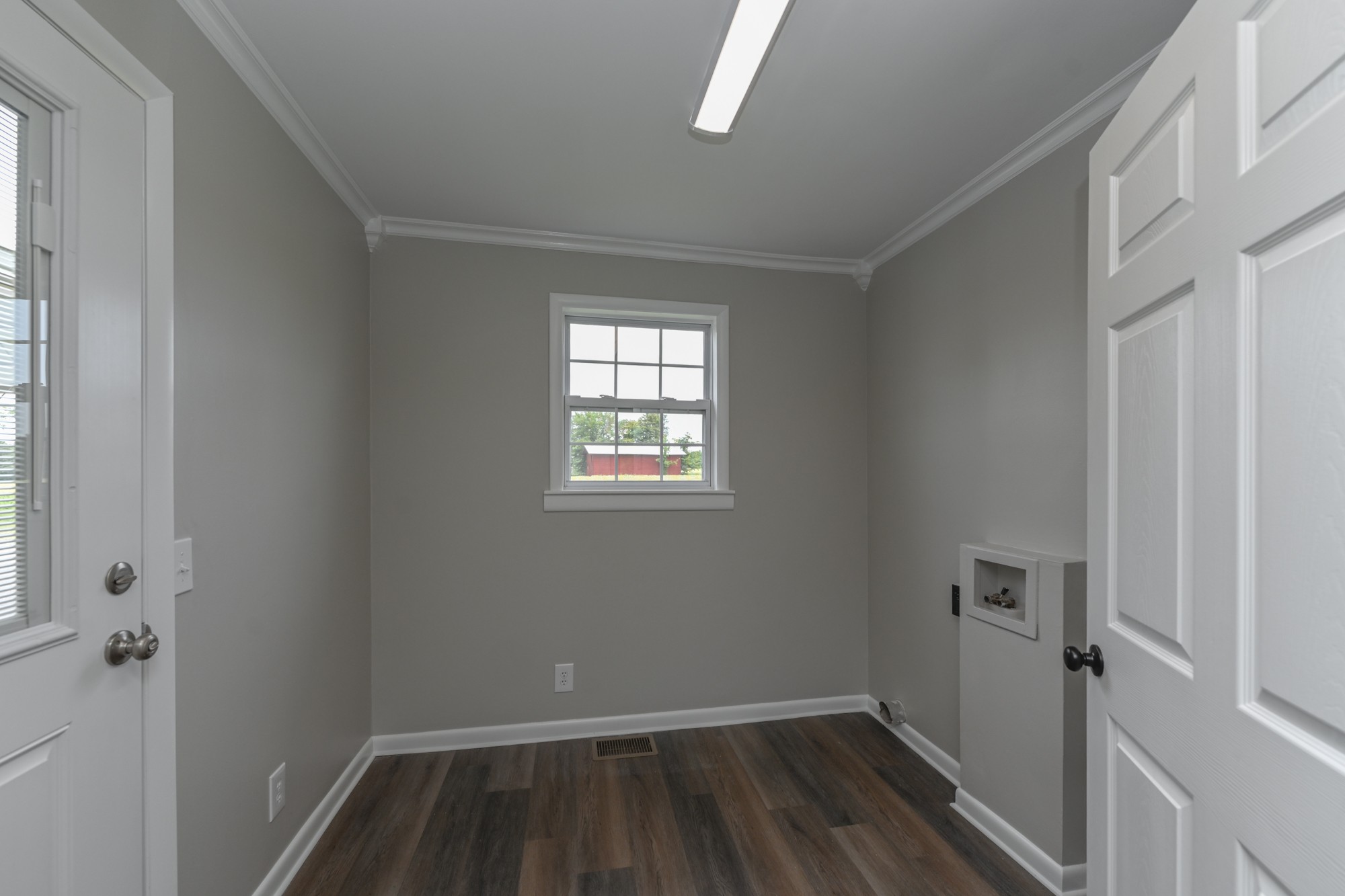 4334 Mt Zion Road Springfield, TN 37172 - Photo 4 of 52 a view of a room with wooden floor and a window