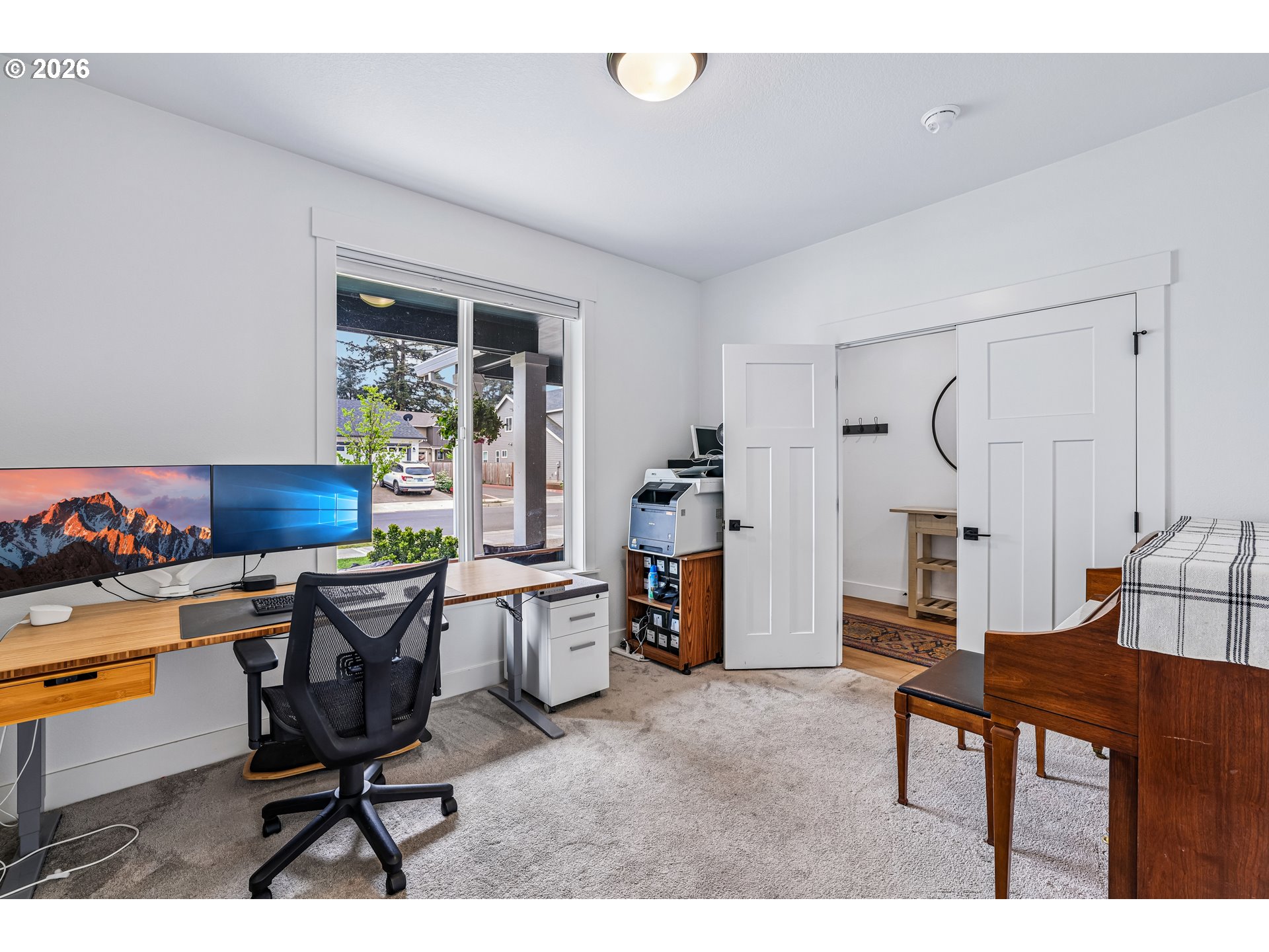236 Northeast 17th Avenue Canby, OR 97013 - Photo 15 of 36 a workspace with furniture and a gate