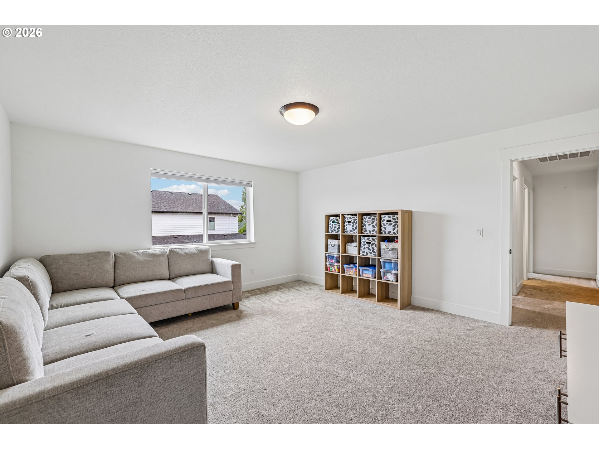 236 Northeast 17th Avenue Canby, OR 97013 - Photo 19 of 36 a living room with furniture and a window