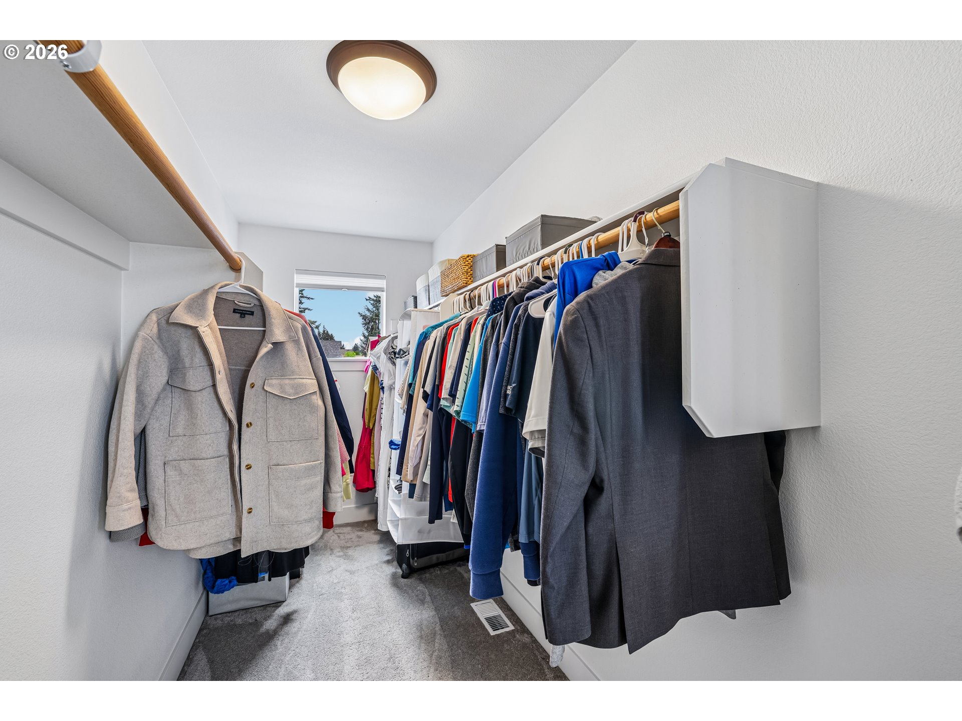 236 Northeast 17th Avenue Canby, OR 97013 - Photo 23 of 36 a view of walk in closet with clothes and shoes