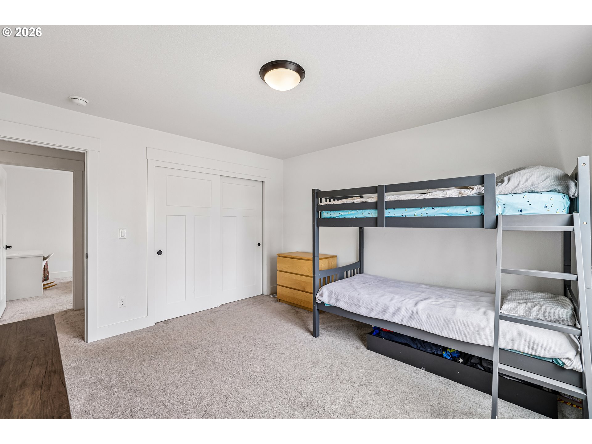 236 Northeast 17th Avenue Canby, OR 97013 - Photo 25 of 36 a bedroom with a bed and cabinets
