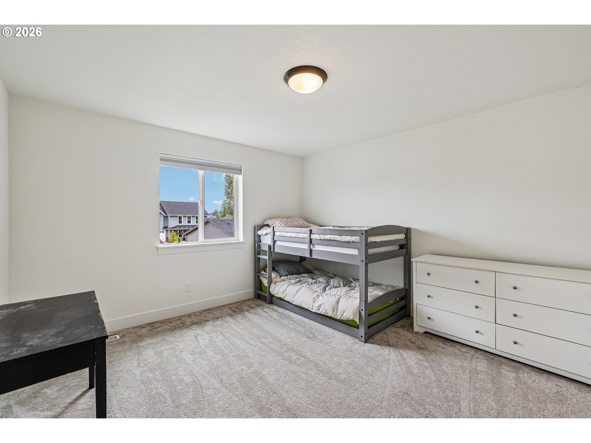 236 Northeast 17th Avenue Canby, OR 97013 - Photo 29 of 36 a bedroom with furniture and a window