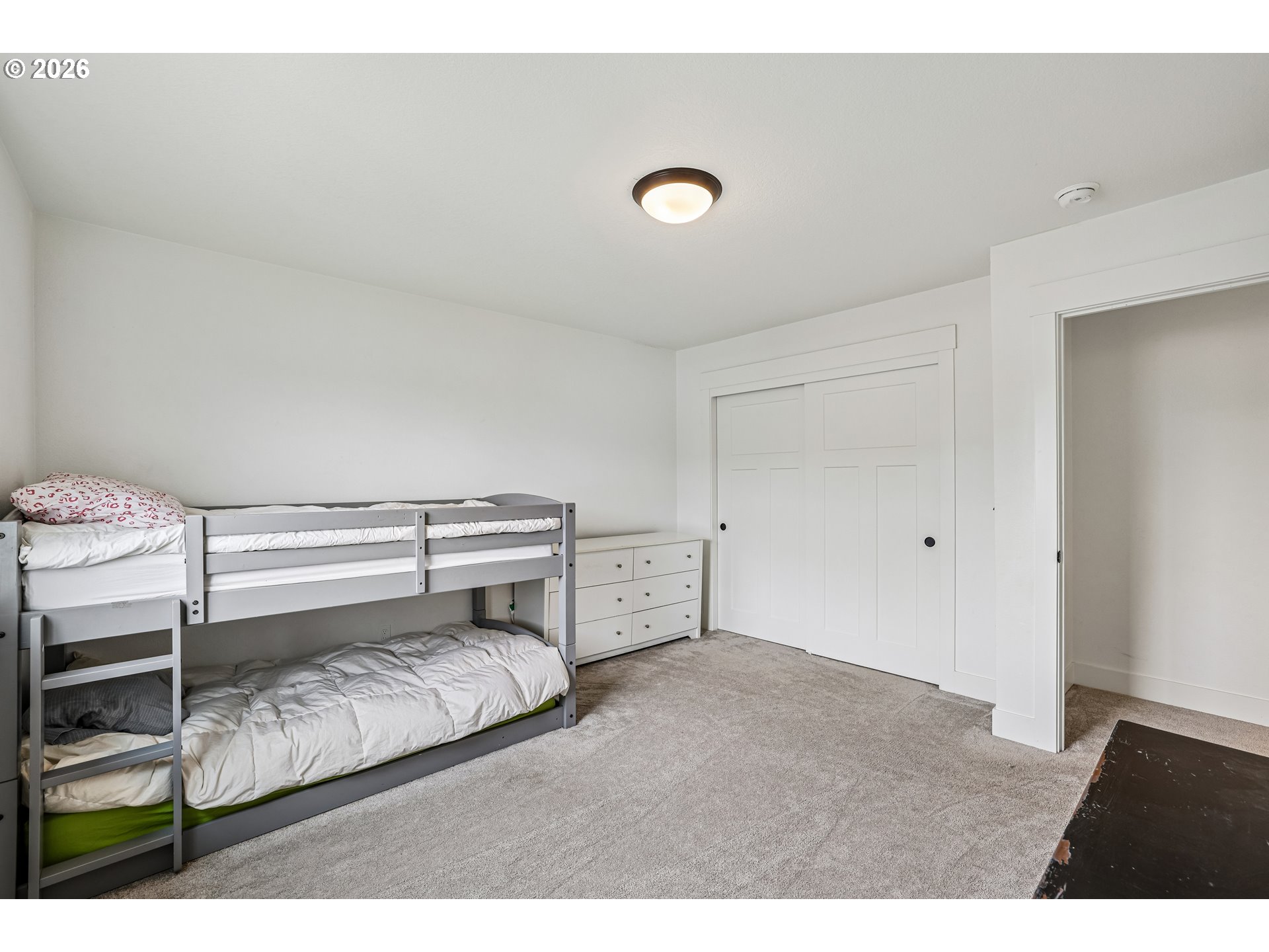 236 Northeast 17th Avenue Canby, OR 97013 - Photo 30 of 36 a bedroom with a bed and a night stand