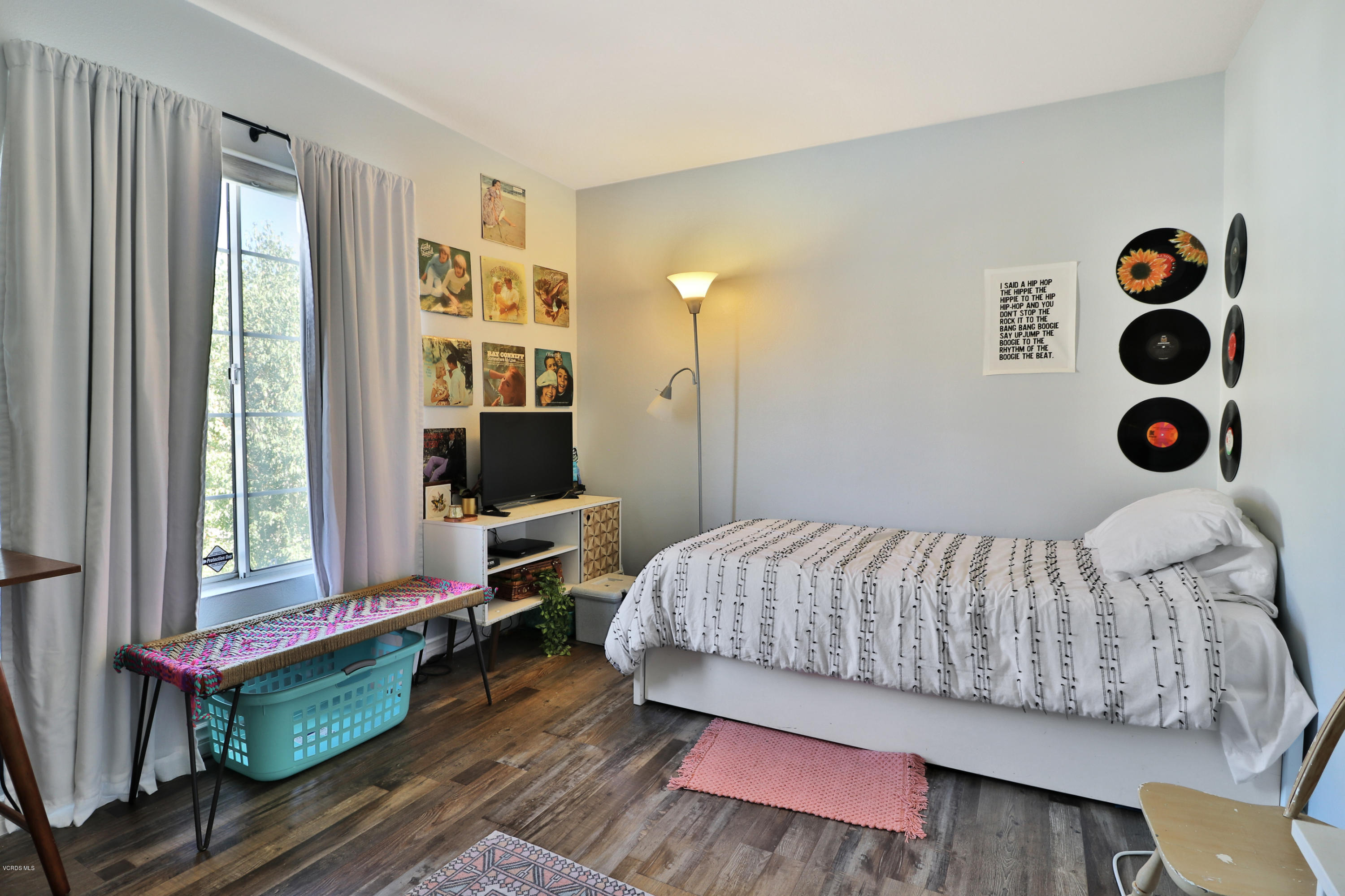 1729 Empty Saddle Road Simi Valley, CA 93063 - Photo 14 of 28 a bedroom with a bed and window