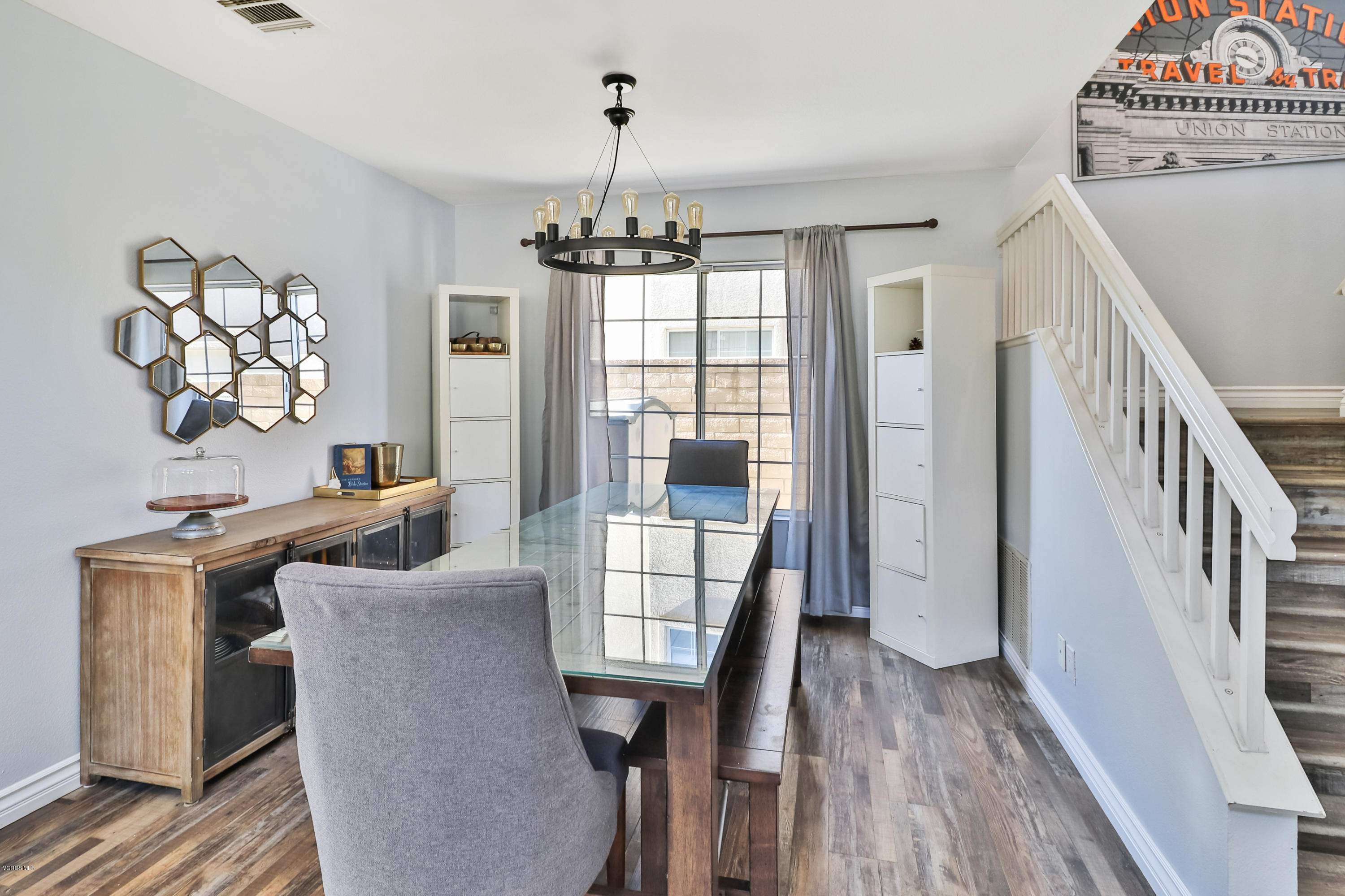 1729 Empty Saddle Road Simi Valley, CA 93063 - Photo 5 of 28 a view of a dining room with furniture window and wooden floor