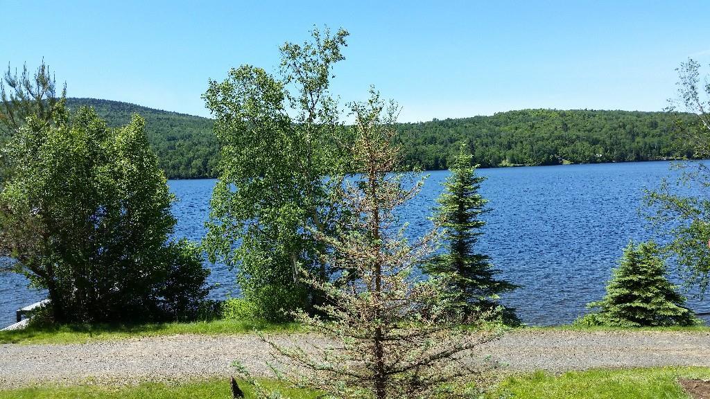 29 Salmon Ledge Road Rangeley, ME 04970 - Photo 12 of 28 View of waterfront from deck