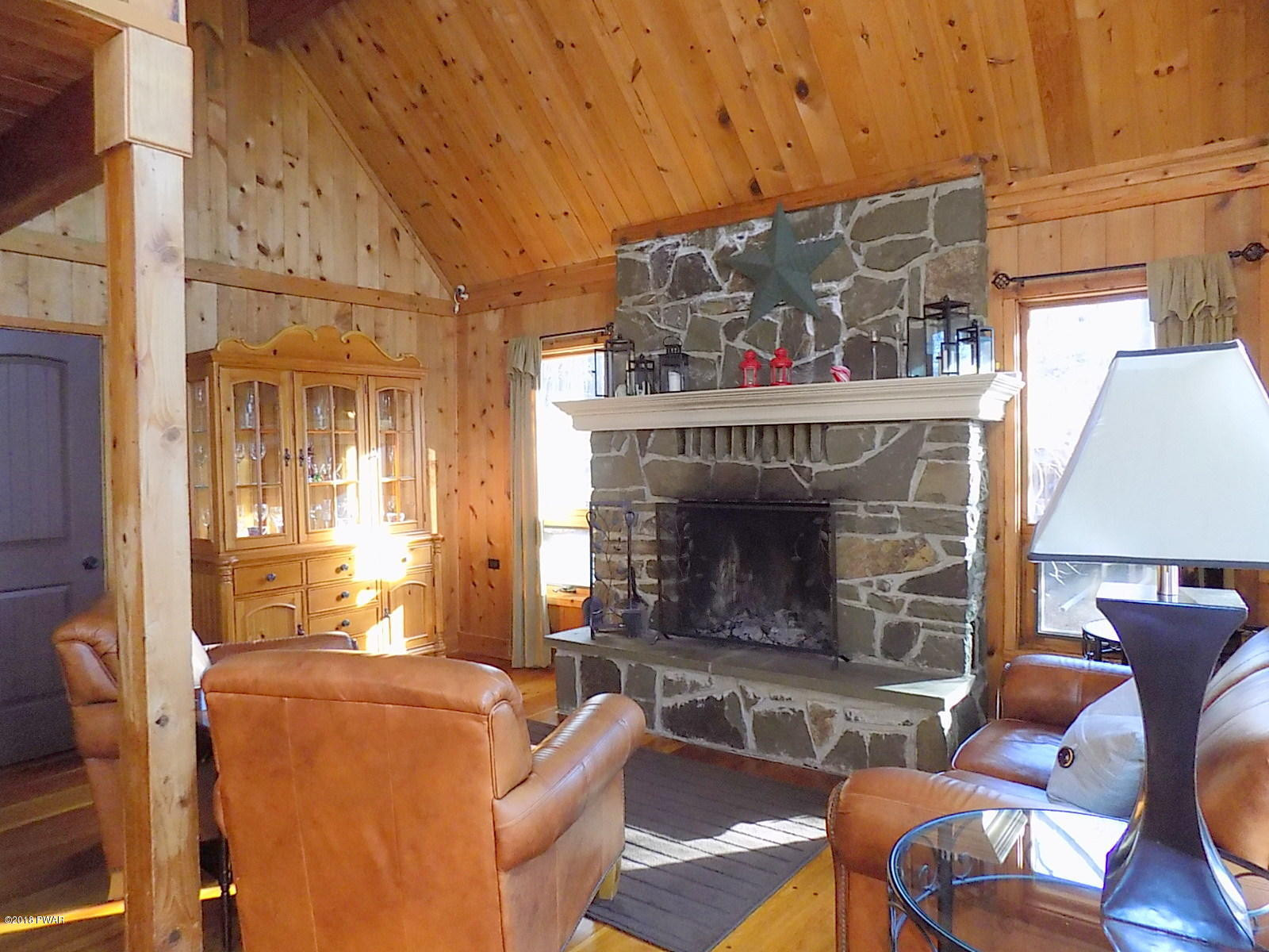 1624 Ridgeview Drive Lake Ariel, PA 18436 - Photo 35 of 35 a living room with furniture a fireplace and a table