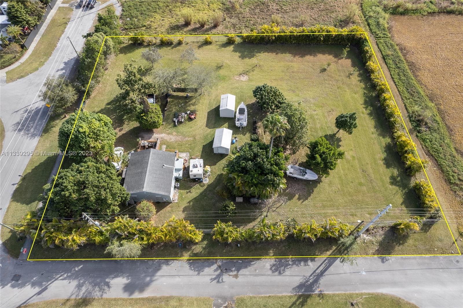 15860 Southwest 304th Street Homestead, FL 33033 - Photo 3 of 7 an aerial view of a house with a lake view