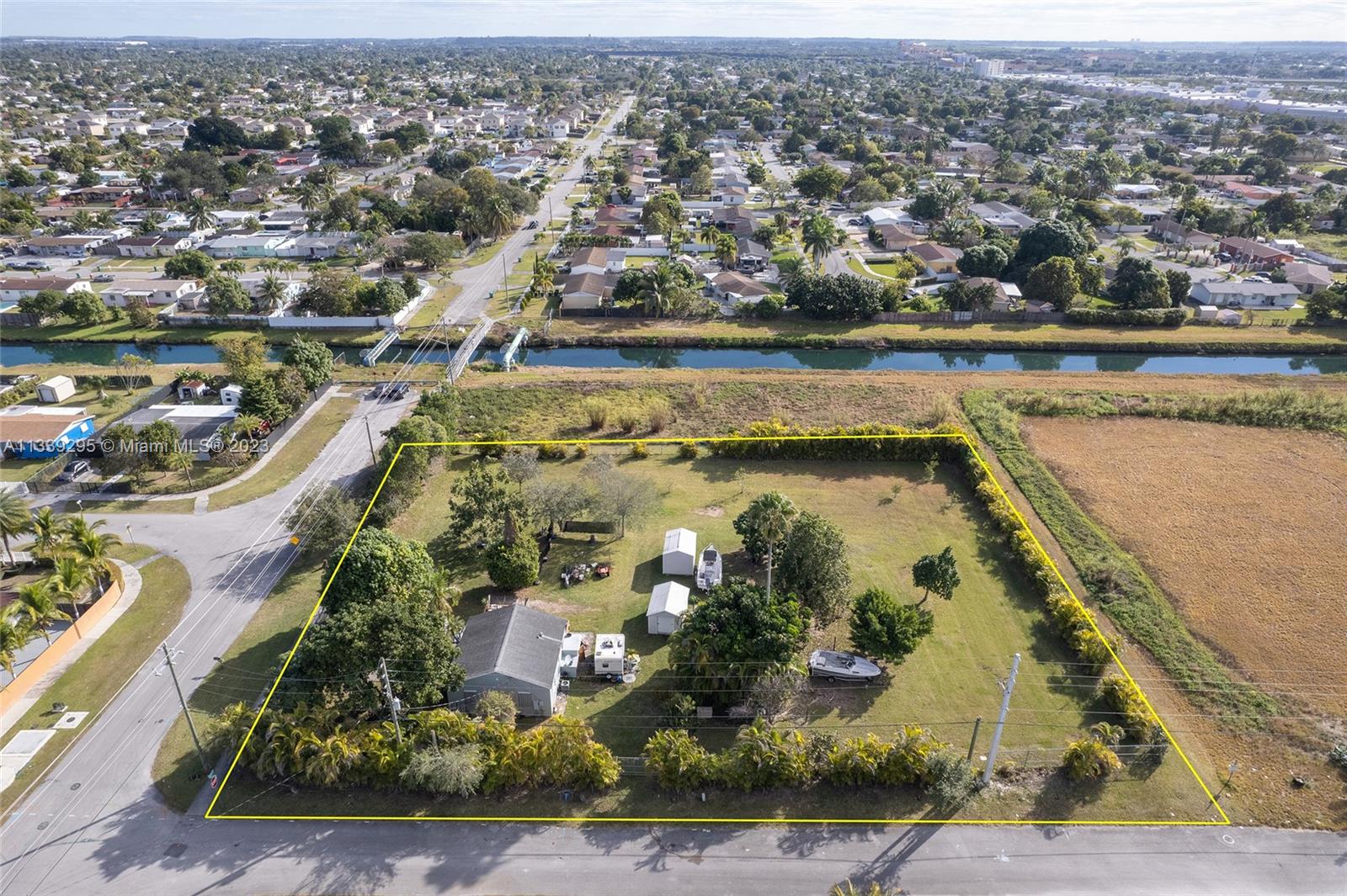 15860 Southwest 304th Street Homestead, FL 33033 - Photo 4 of 7 an aerial view of residential houses with outdoor space