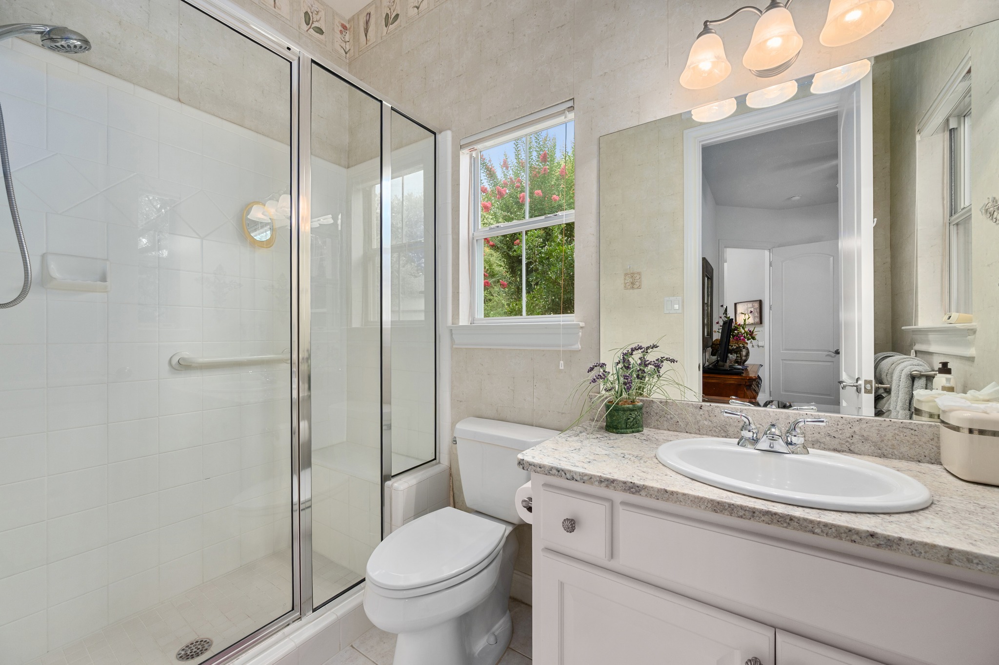 29 Meadows End Georgetown, TX 78628 - Photo 23 of 38 a bathroom with a granite countertop sink toilet and shower