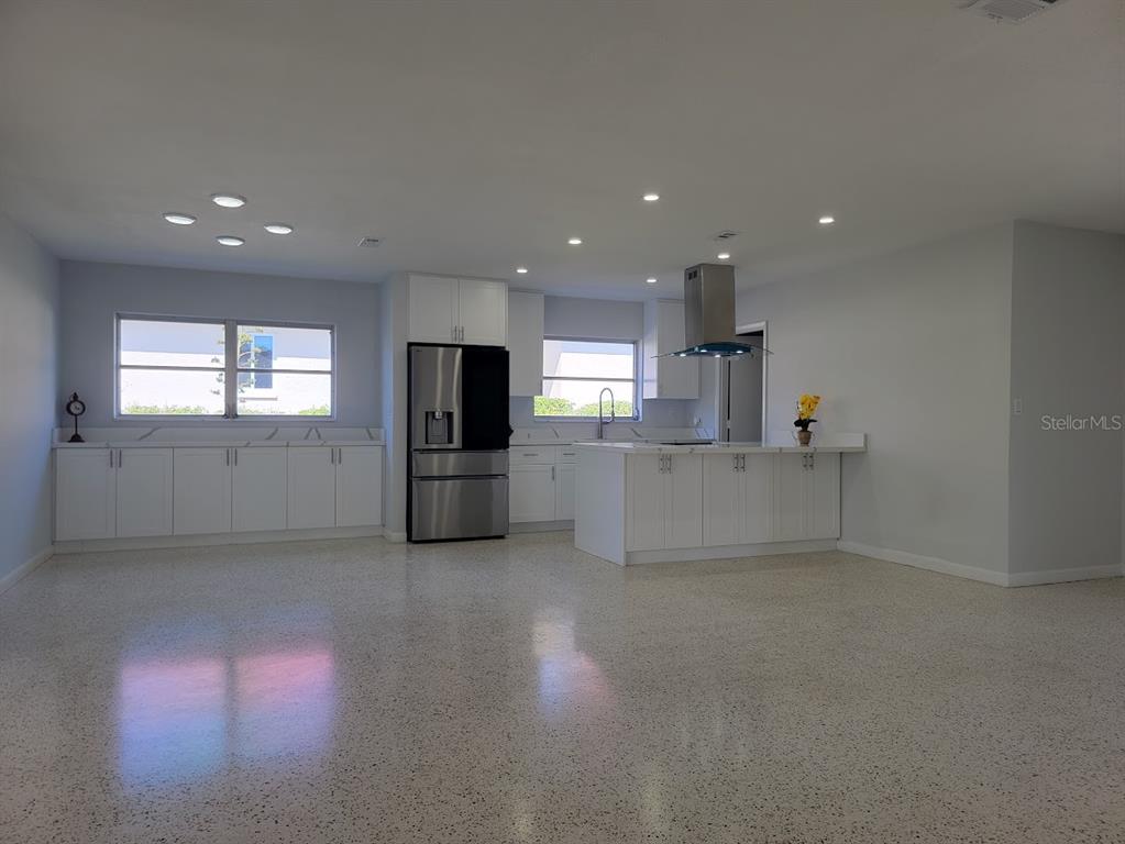 1732 Boca Raton Court Punta Gorda, FL 33950 - Photo 31 of 64 a kitchen with stainless steel appliances a refrigerator and a microwave