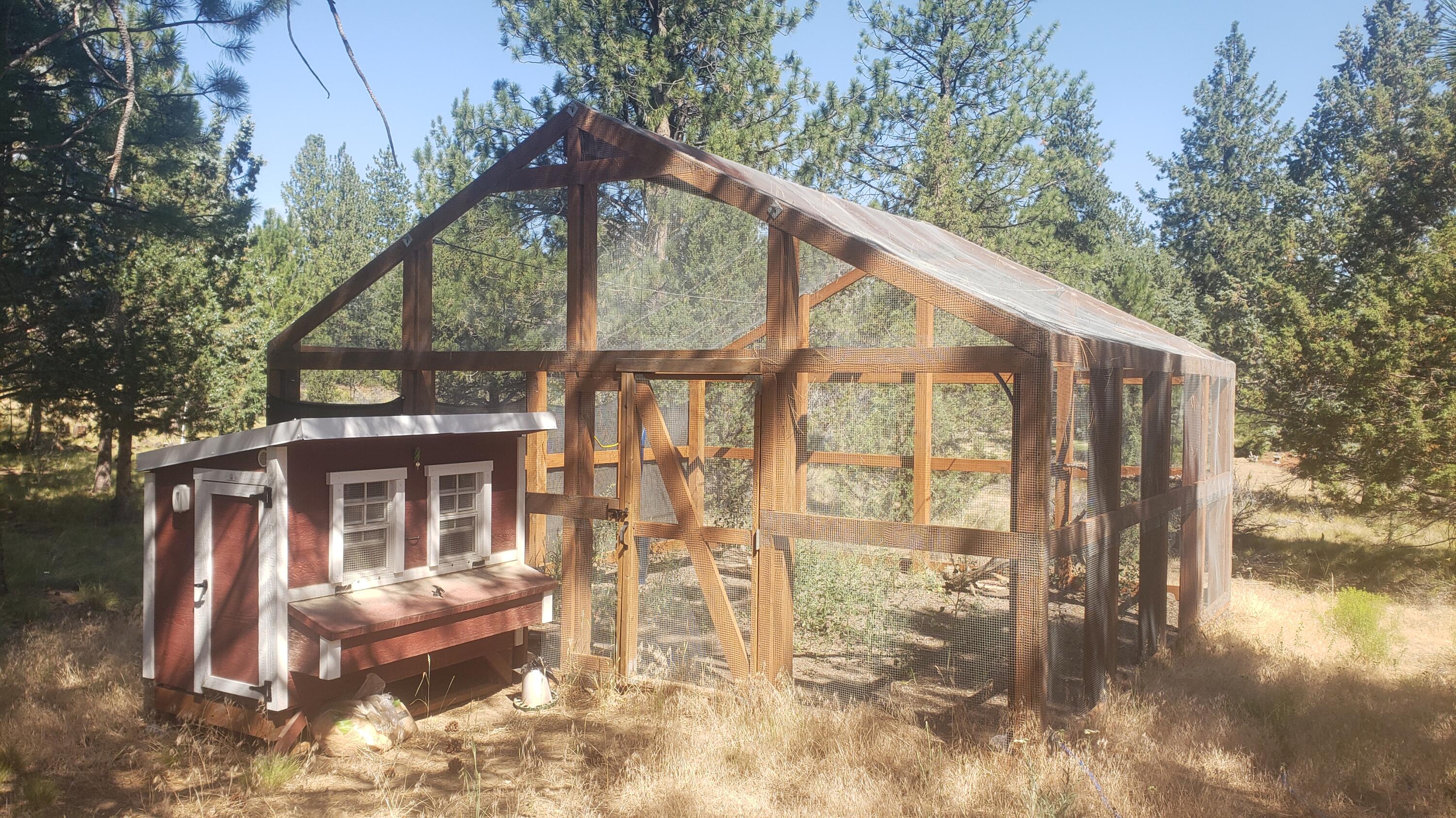 60305 Woodside Road Bend, OR 97702 - Photo 28 of 35 Chicken coop and large screened area for garden or pets, etc.