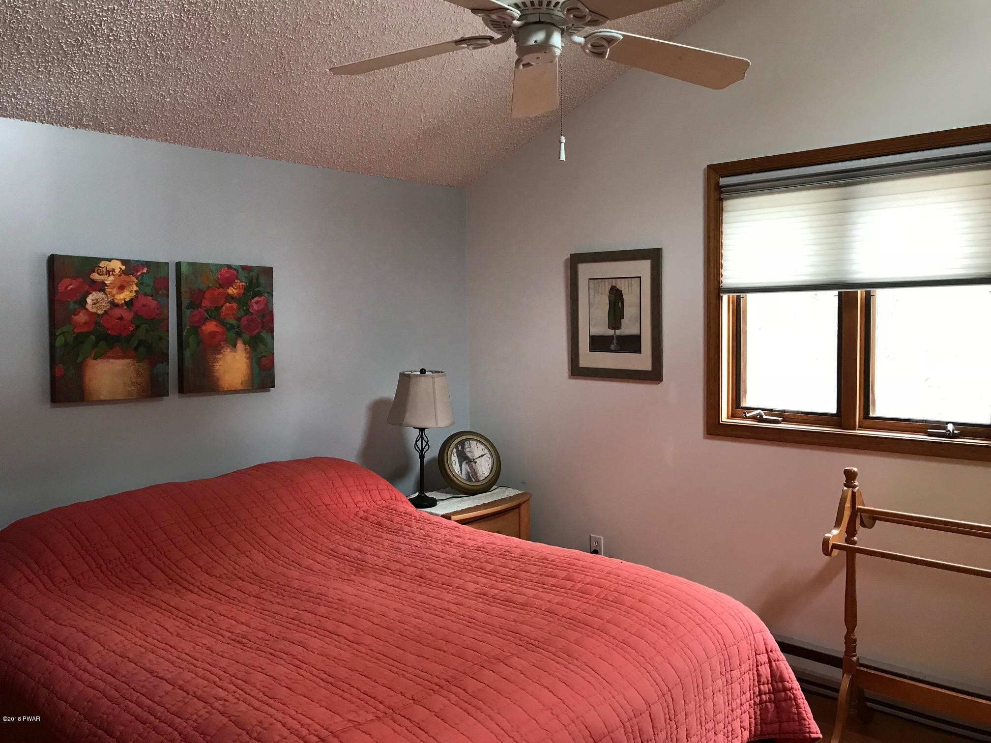 2335 Brookfield Road Lake Ariel, PA 18436 - Photo 15 of 42 a bedroom with a bed and a window