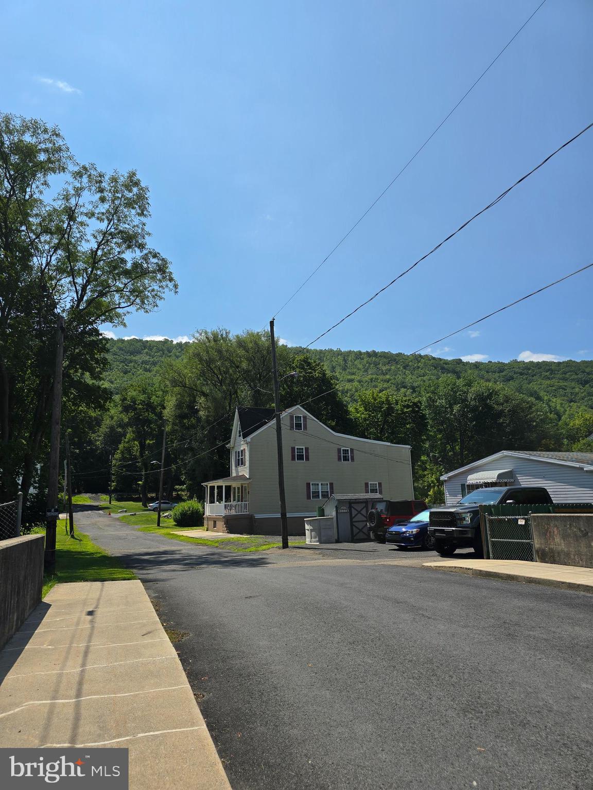 101 Bridge Street Mahanoy Plane, PA 17949 - Photo 14 of 39 a view of street with parked cars
