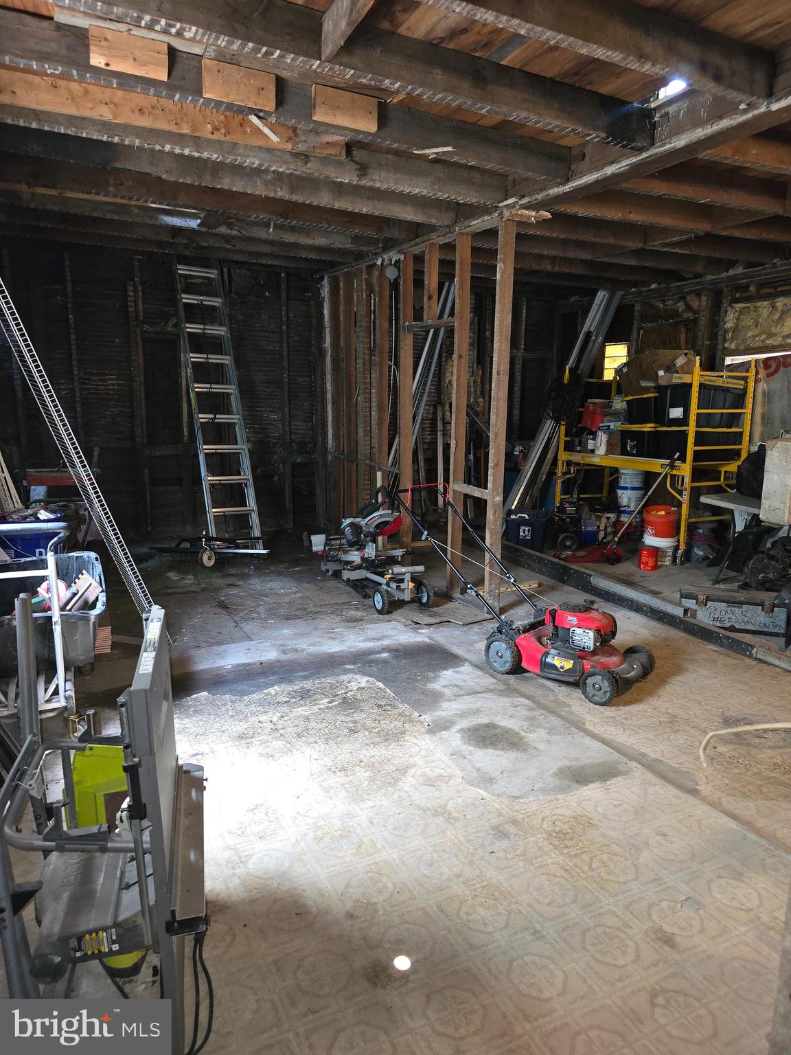 101 Bridge Street Mahanoy Plane, PA 17949 - Photo 24 of 39 a view of a garage with parked cars