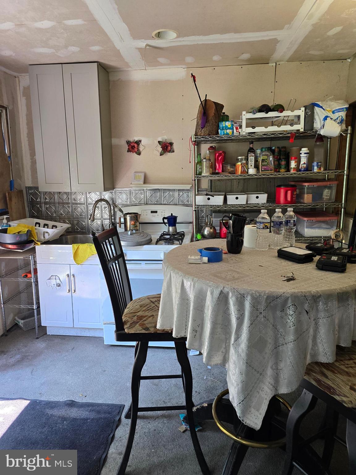 101 Bridge Street Mahanoy Plane, PA 17949 - Photo 29 of 39 a room with lots of furniture and clutter