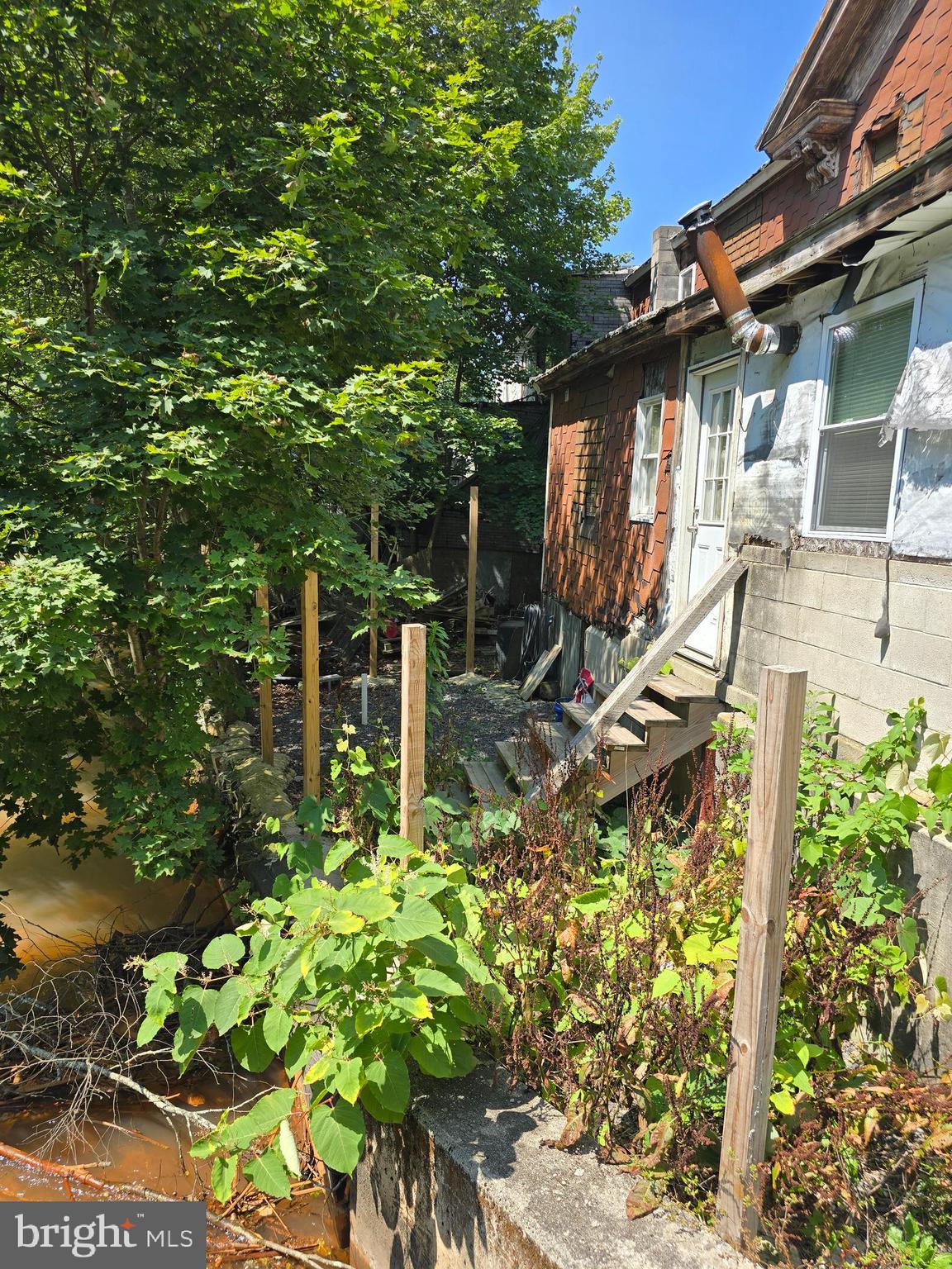101 Bridge Street Mahanoy Plane, PA 17949 - Photo 4 of 39 a backyard of a house with lots of green space