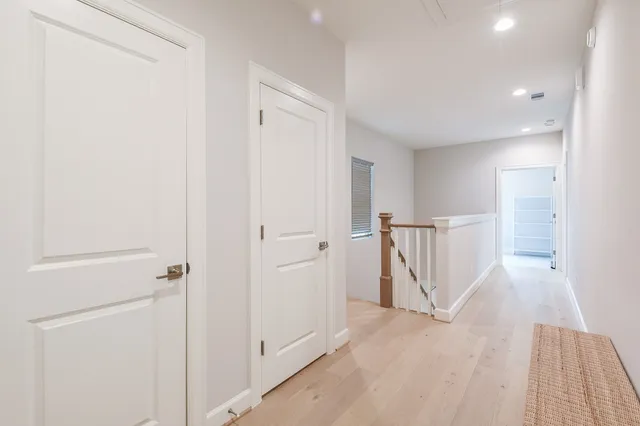 a view of a livingroom with wooden floor