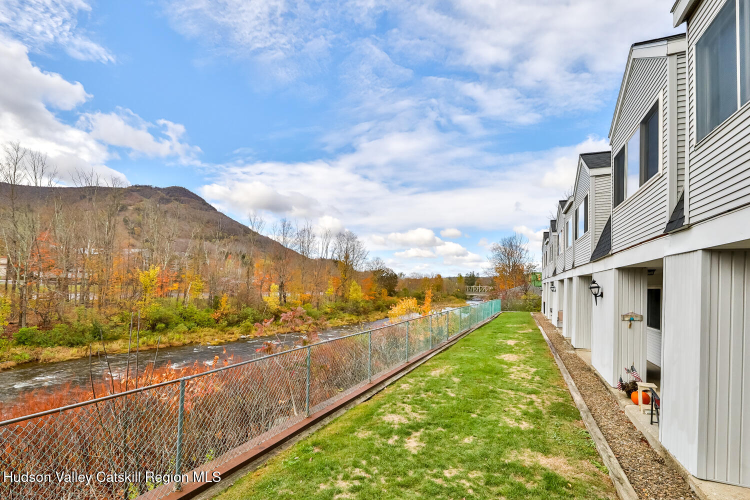 a view of swimming pool with a yard
