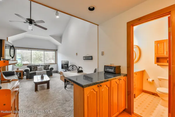 a very nice looking living room with a large window
