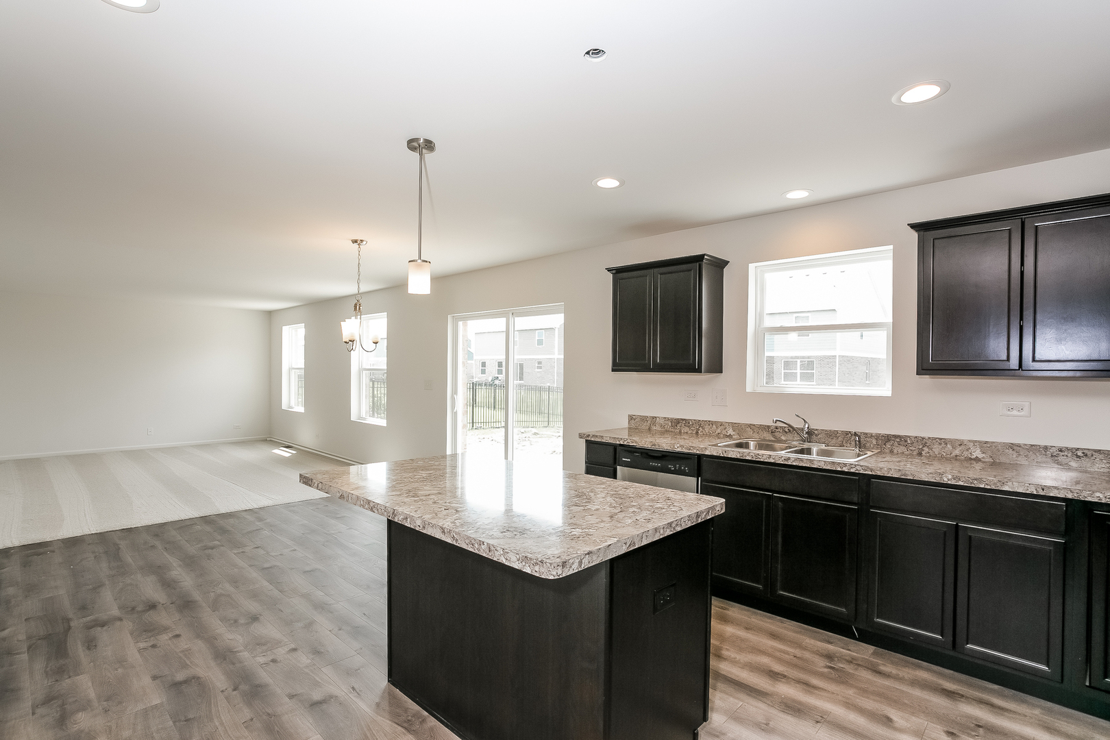 1978 Stapleton Road New Lenox, IL 60451 - Photo 25 of 48 a kitchen with granite countertop a sink and a stove