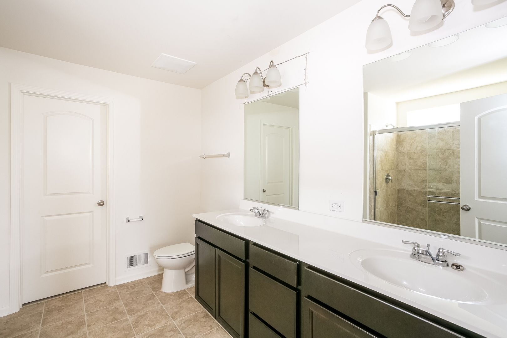 1978 Stapleton Road New Lenox, IL 60451 - Photo 29 of 48 a bathroom with a double vanity sink mirror and toilet