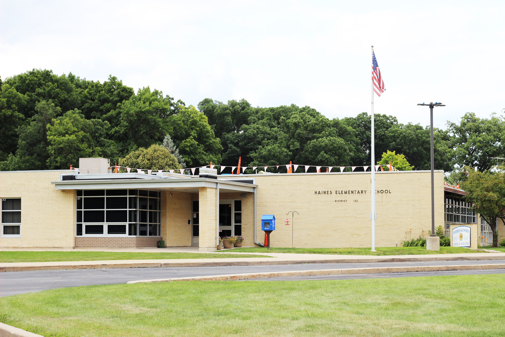 1978 Stapleton Road New Lenox, IL 60451 - Photo 38 of 48 a view of a white building with a big yard and plants