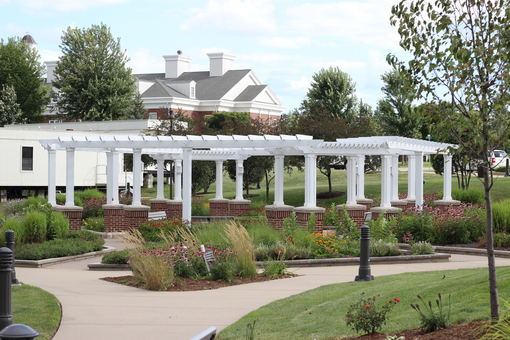 1978 Stapleton Road New Lenox, IL 60451 - Photo 40 of 48 a front view of a house with a yard and potted plants