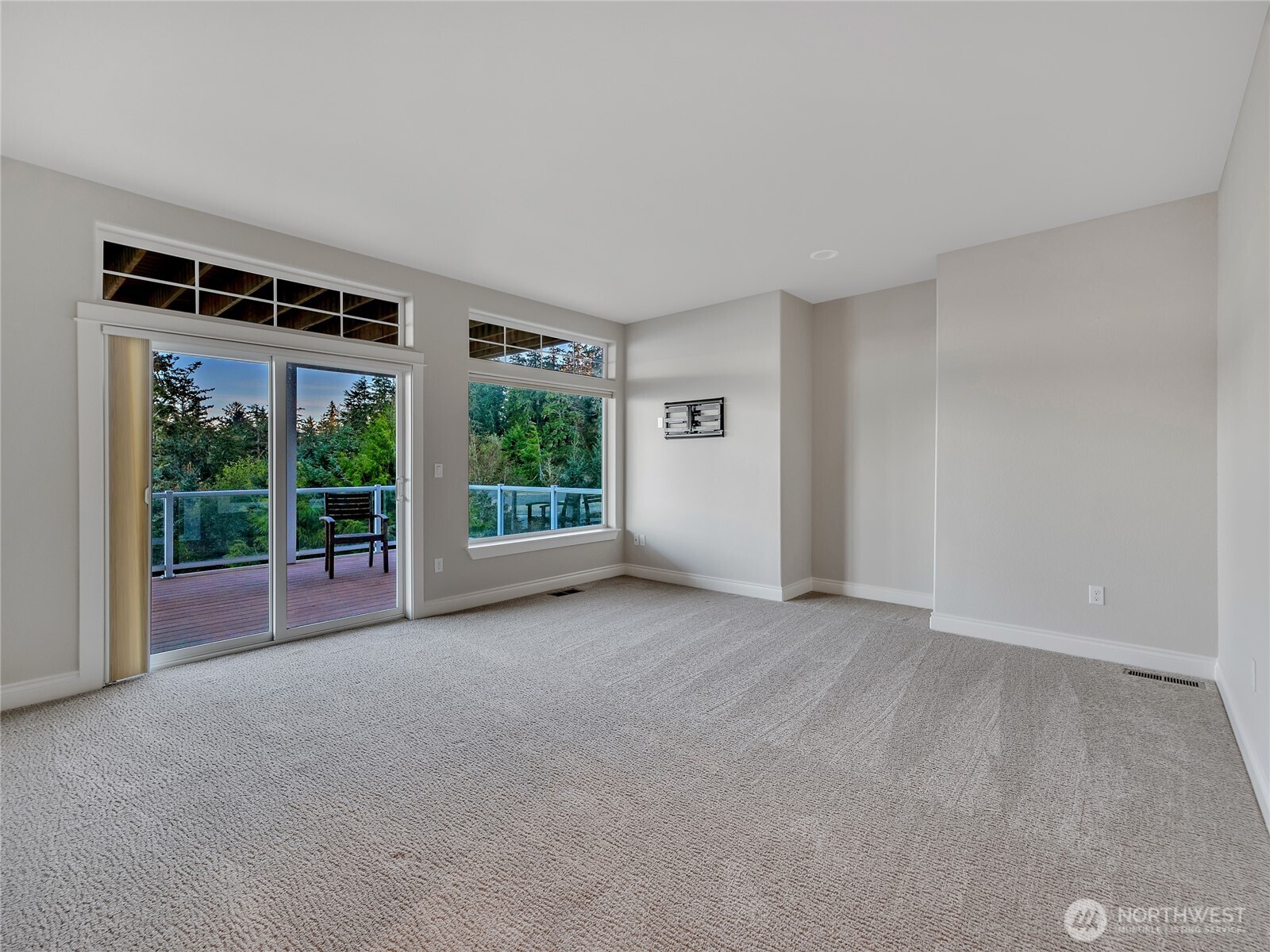 3224 Overlook Loop Ilwaco, WA 98624 - Photo 21 of 38 a view of an empty room with a balcony