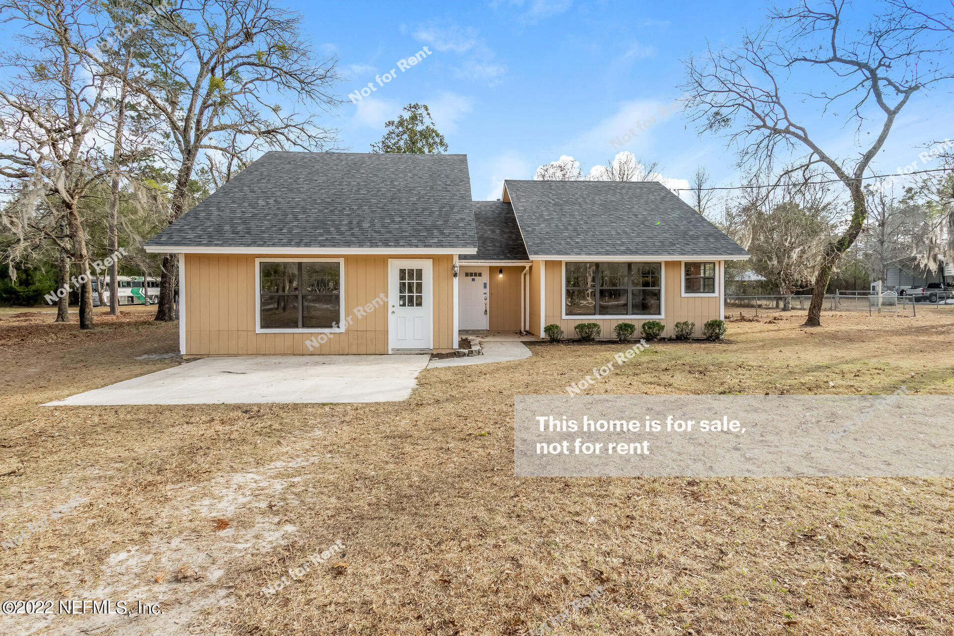 4205 Mustang Road Middleburg, FL 32068 - Photo 1 of 27 a front view of a house with a yard