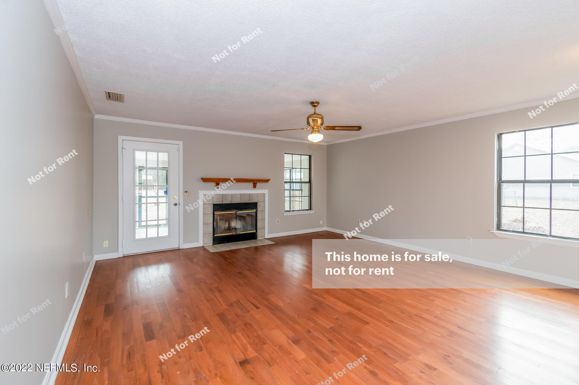 4205 Mustang Road Middleburg, FL 32068 - Photo 8 of 27 a view of an empty room with window and fire place