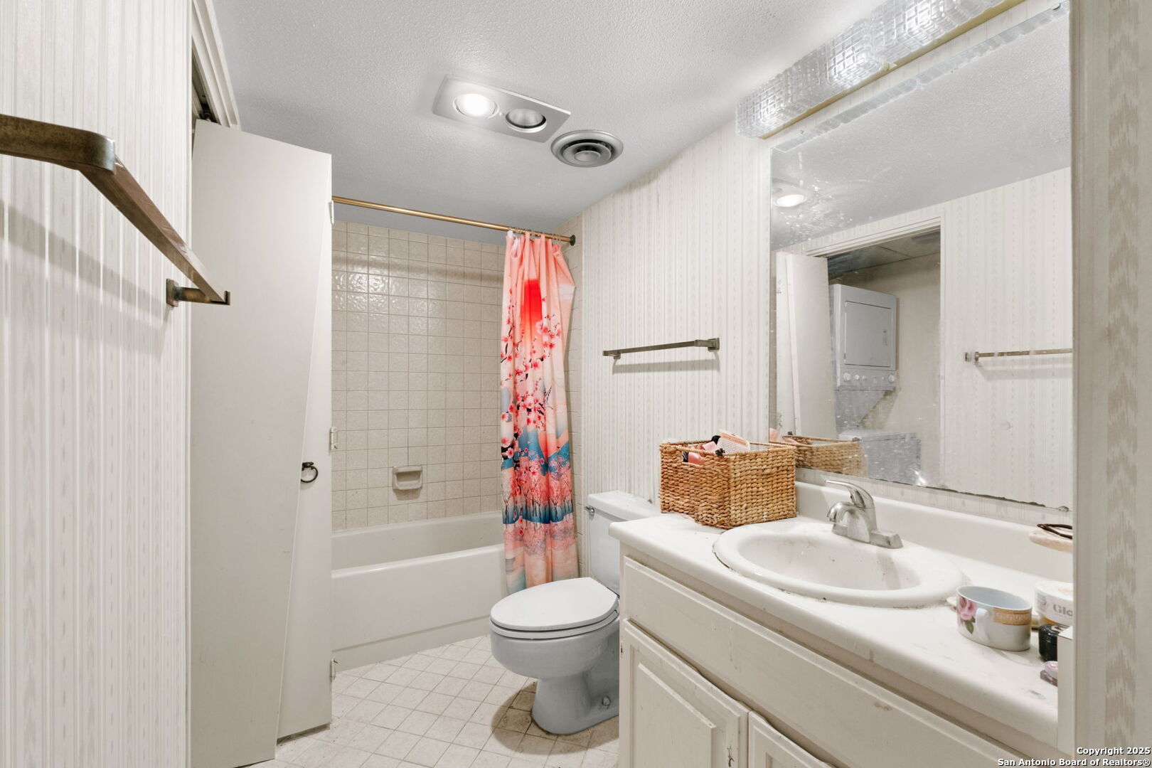 7701 Wurzbach Road, Unit 907 San Antonio, TX 78229 - Photo 17 of 25 a bathroom with a sink toilet and shower