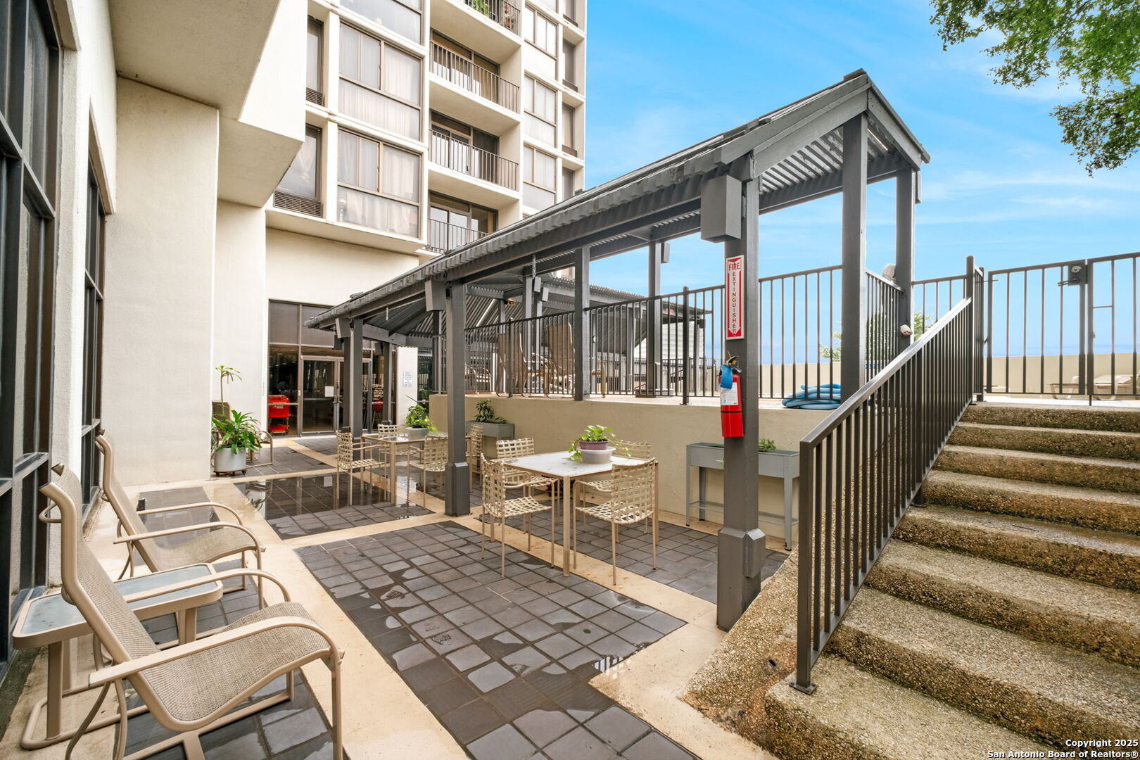 7701 Wurzbach Road, Unit 907 San Antonio, TX 78229 - Photo 20 of 25 a view of entryway and hall with wooden floor