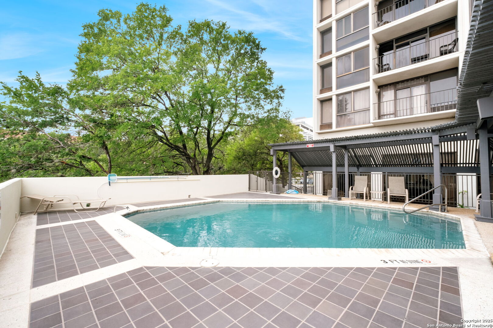 7701 Wurzbach Road, Unit 907 San Antonio, TX 78229 - Photo 24 of 25 a view of a building with a outdoor space