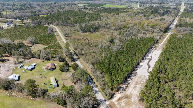a aerial view of residential house with outdoor space