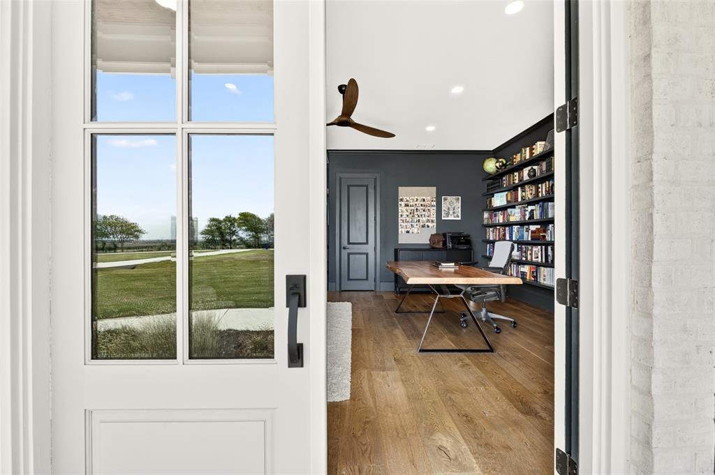 10932 Gregory Road Sanger, TX 76266 - Photo 27 of 40 Interior space featuring wood-finish flooring, recessed lighting, and a built-in wall-mounted shelving unit