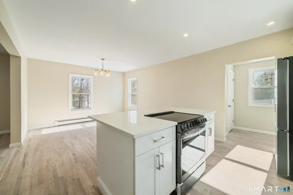 a view of kitchen with stove