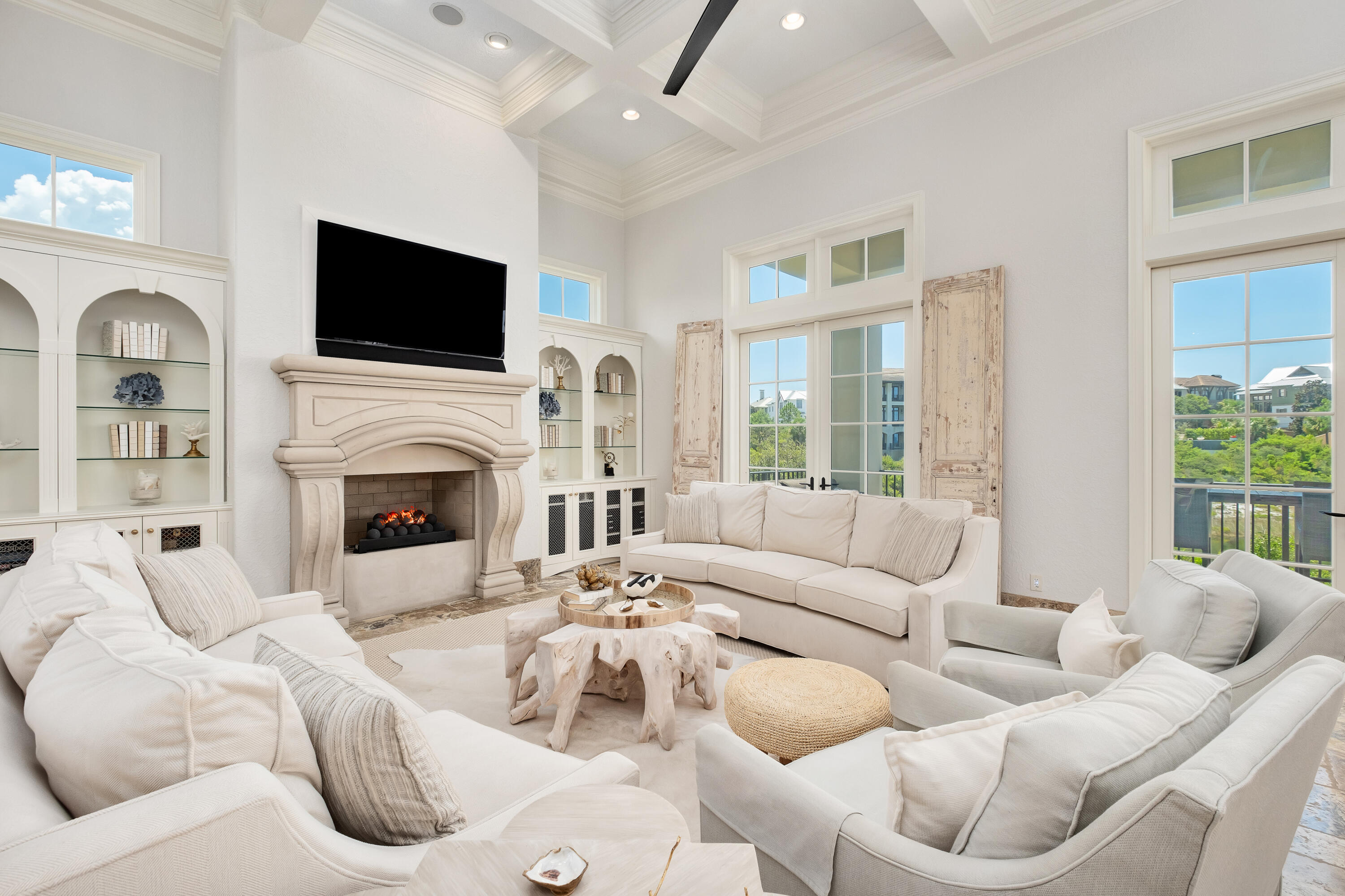 231 West Bermuda Drive Santa Rosa Beach, FL 32459 - Photo 12 of 47 a living room with furniture fireplace and flat screen tv