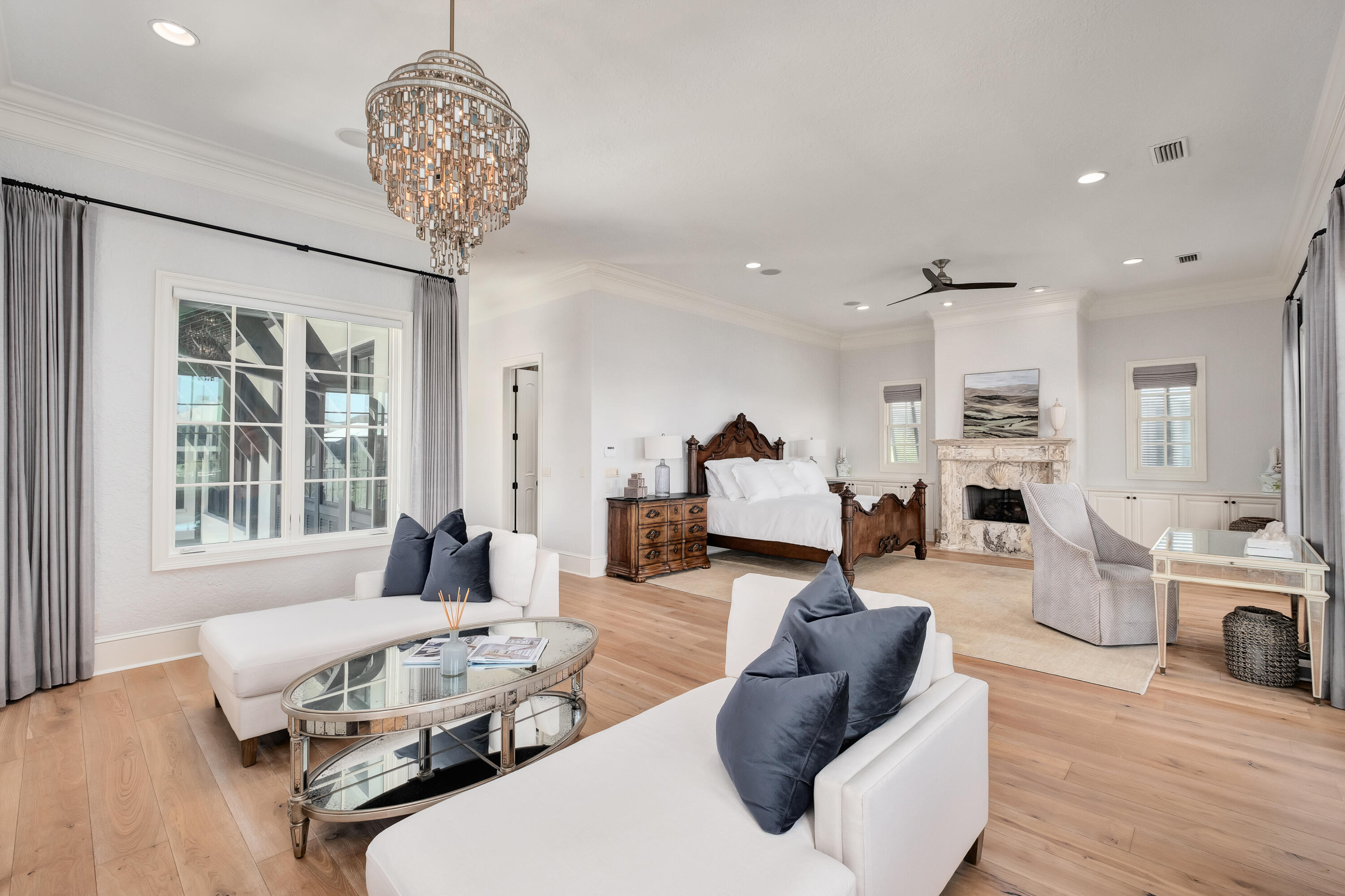 231 West Bermuda Drive Santa Rosa Beach, FL 32459 - Photo 28 of 47 a living room with furniture and a chandelier