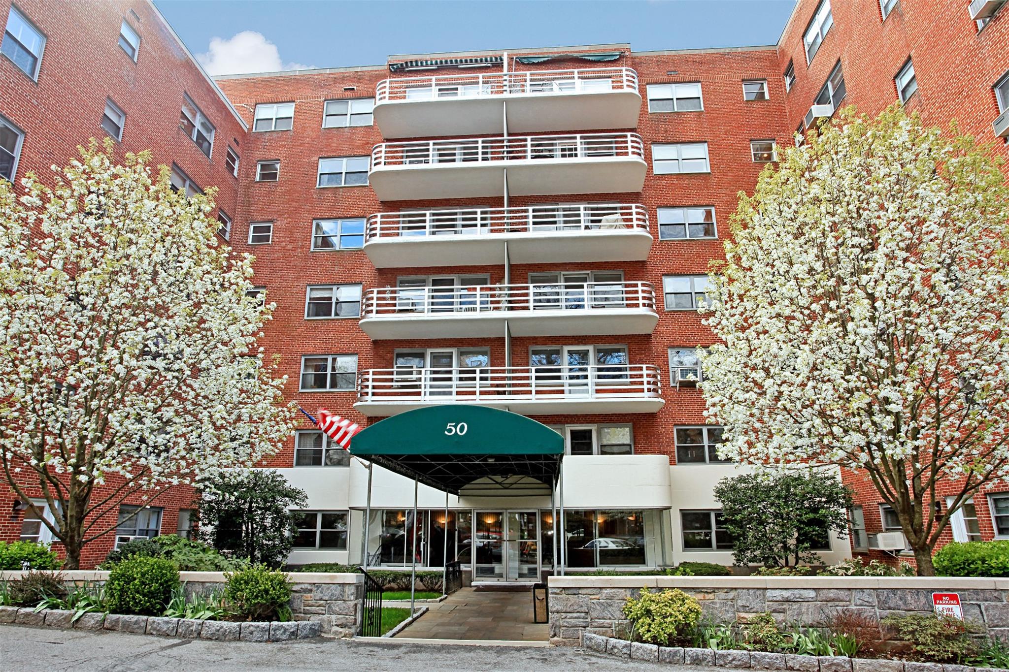 front view of a building with a street