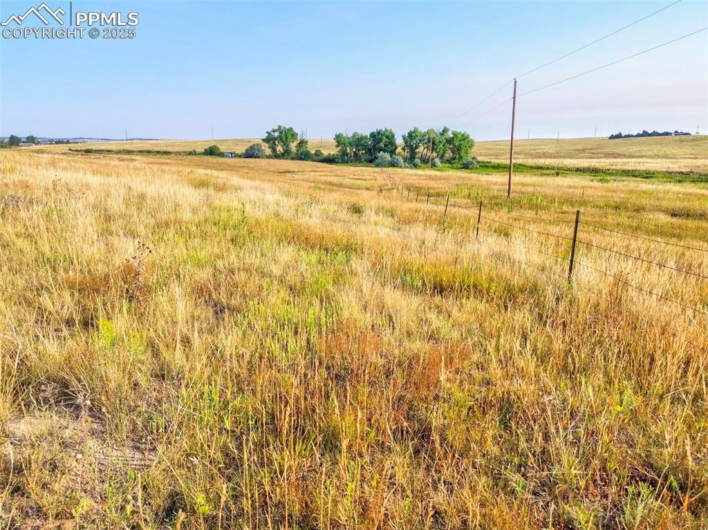 11950 Log Road Peyton, CO 80831 - Photo 14 of 17 a view of an ocean and beach