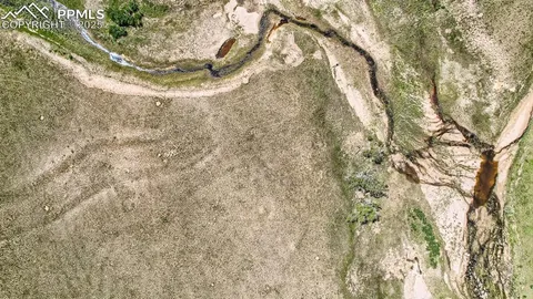 a view of a lake with a city