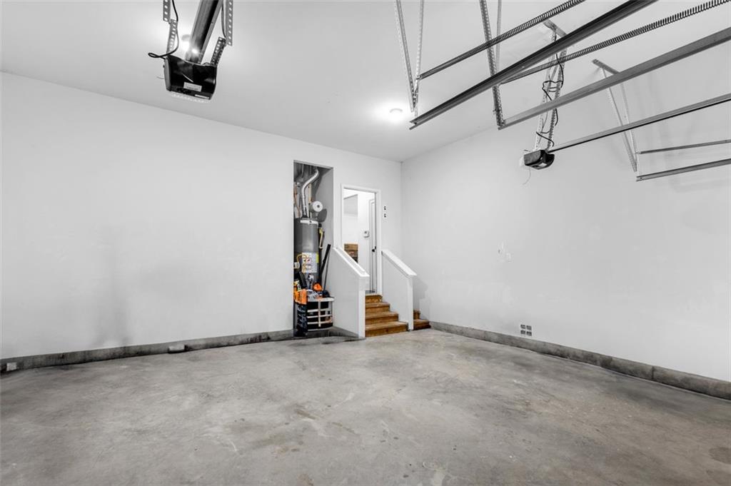 908 Rainsong Court Braselton, GA 30517 - Photo 36 of 79 a view of a room with rack on the wall