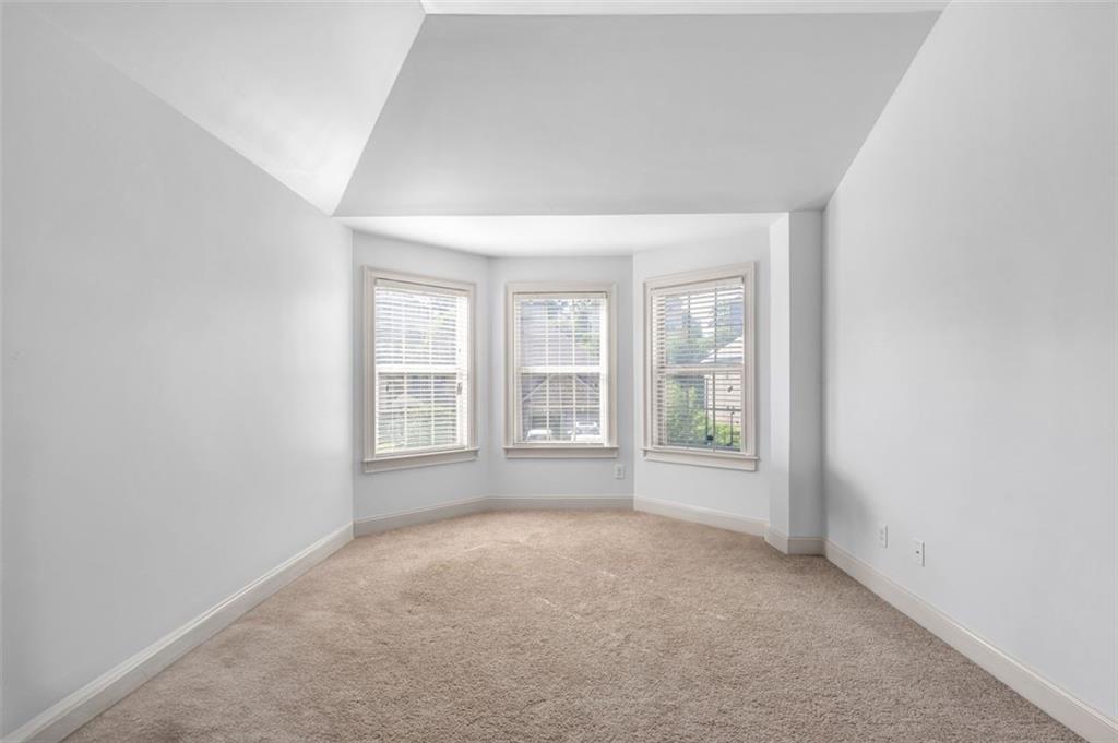 908 Rainsong Court Braselton, GA 30517 - Photo 46 of 79 an empty room with windows