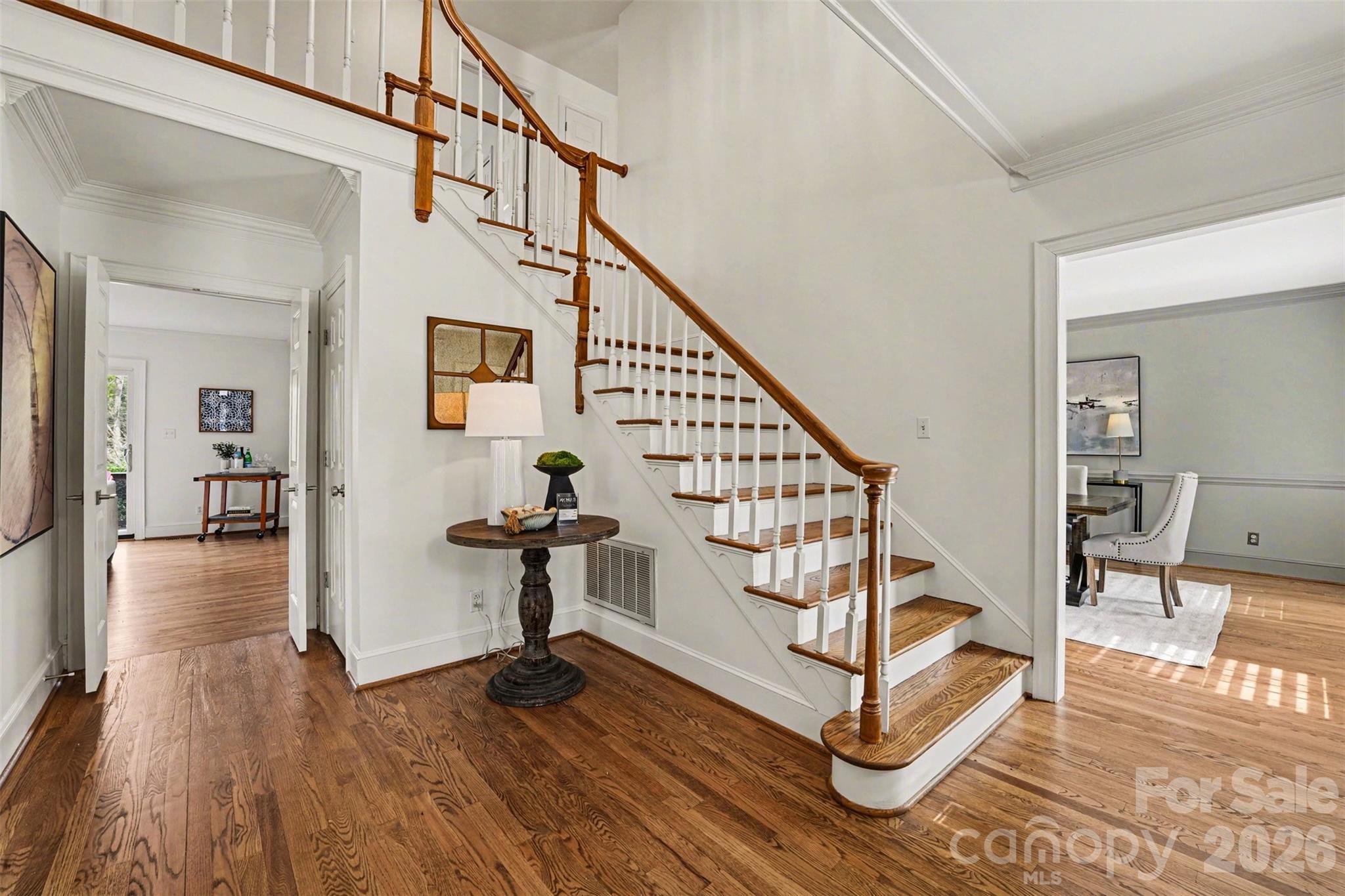 5606 Hillingdon Road Charlotte, NC 28226 - Photo 2 of 41 a view of entryway and hall with wooden floor